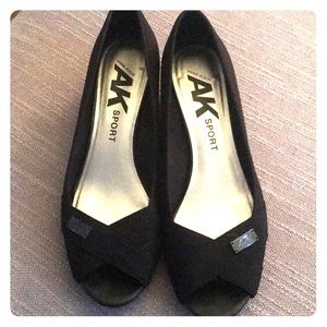 Opened toed low heels. Heel is about an inch